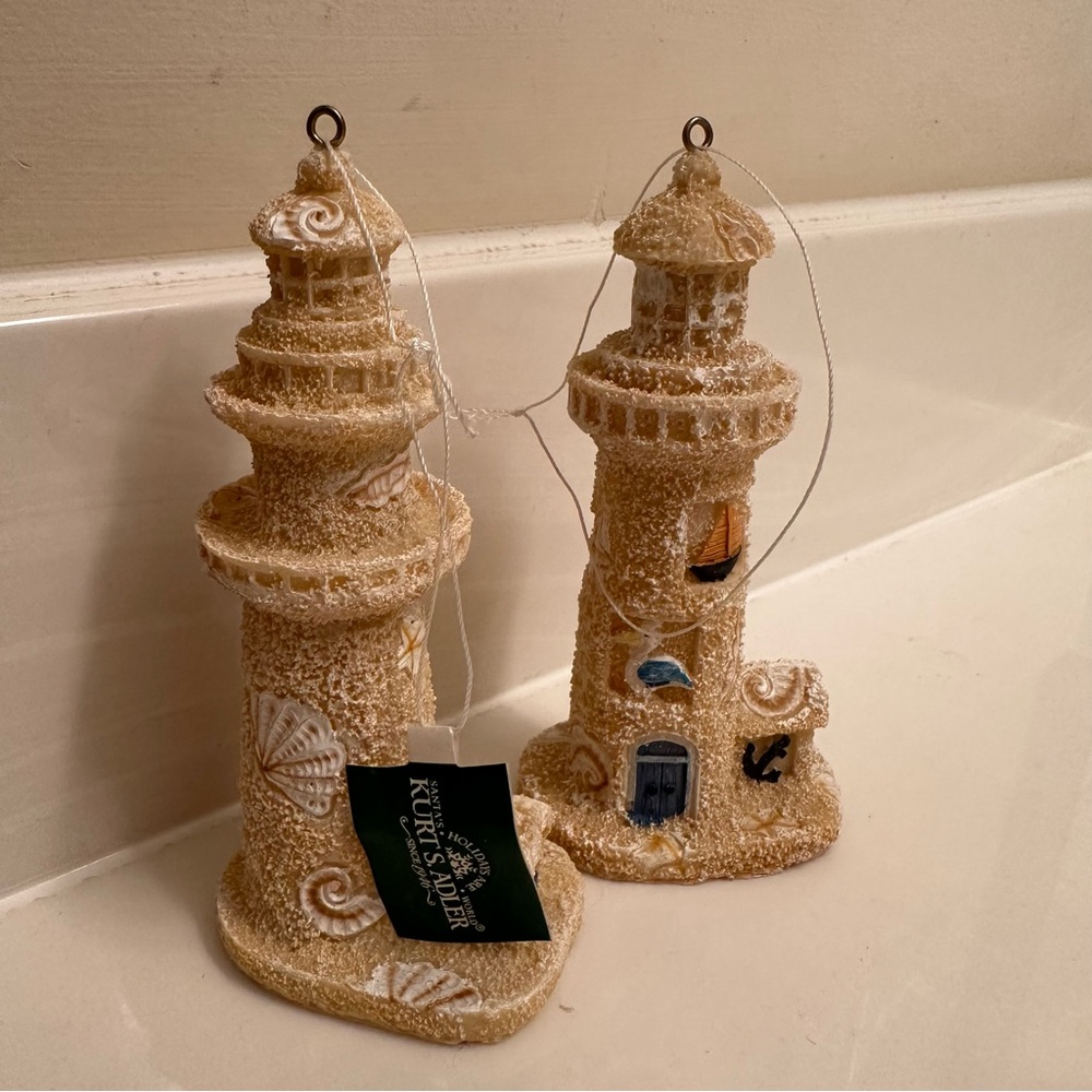 *set of 2* Kurt Adler Christmas tree ornaments. Sand lighthouse ornament.